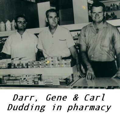 Darr, Gene & Carl Dudding in pharmacy